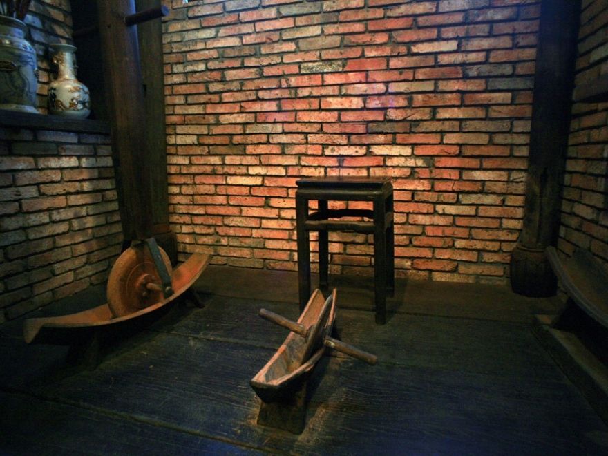 The pharmacist would sit in a chair and use both feet to turn the wheel of the rotating stool lying on the floor.