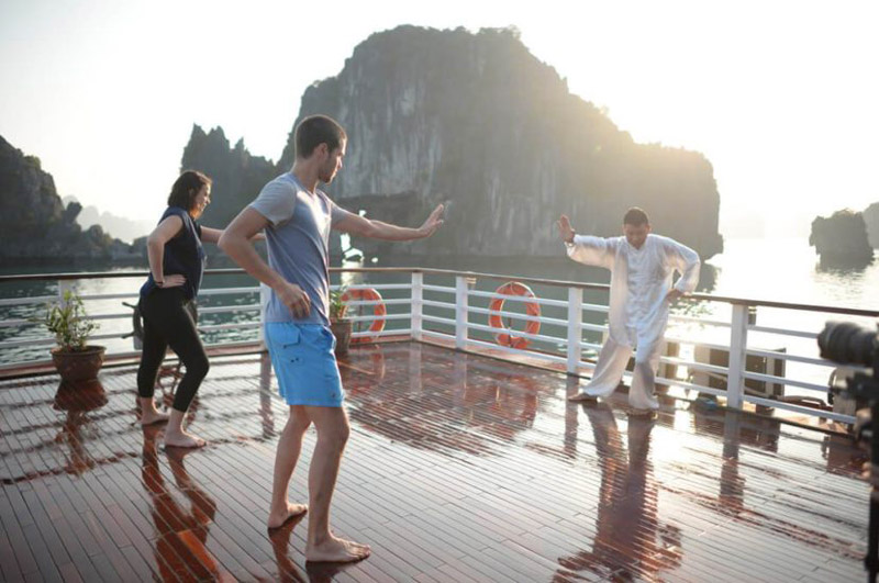 Practice tai chi on a Lan Ha Bay cruise