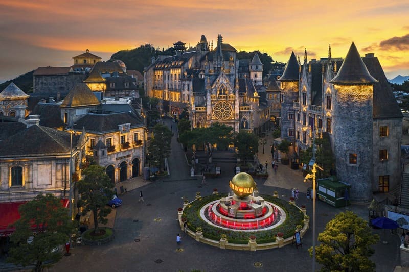 Sunset glow over the European-style buildings of Ba Na Hills