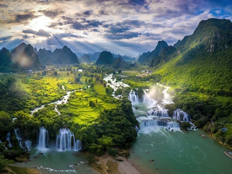 Ban Gioc Waterfall in Cao Bang, often combined with a visit to Nguom Ngao Cave.