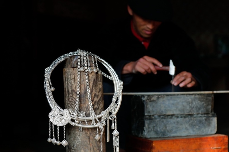Silver jewelry artisans in Lao Chai village