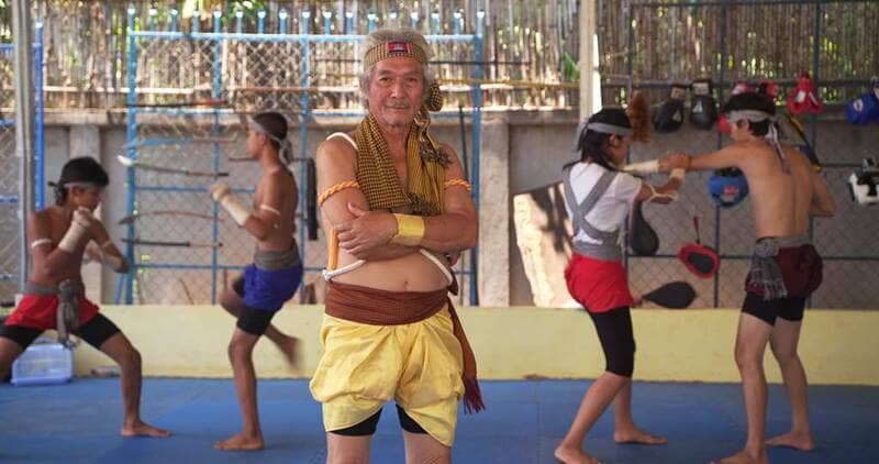Master San Kim Sean with the golden krama - a person who made a major contribution to Bokator.