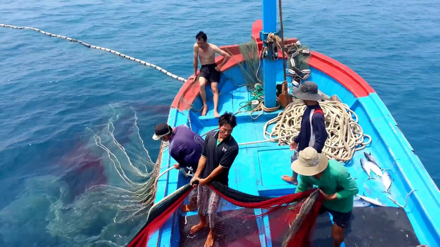 Fishermen fishing at Cua Van fishing village