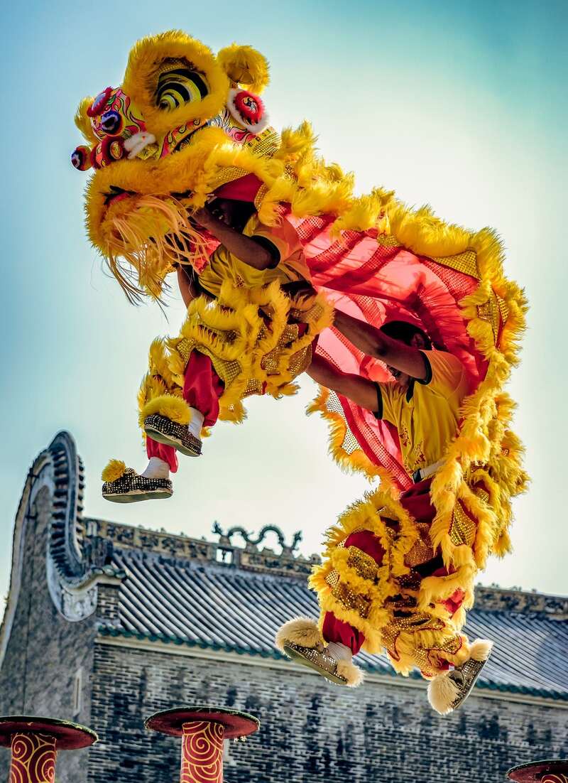High jumping skills over poles in Vietnamese lion dance