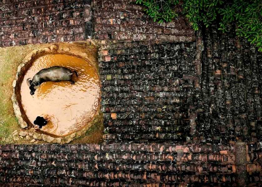 A panoramic view of the Yin-Yang tiled roof village from above.