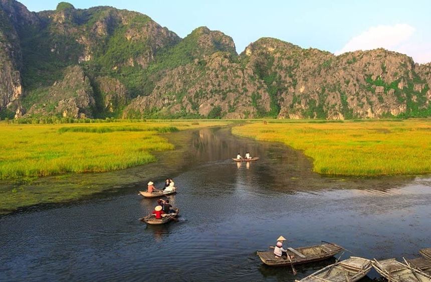 Majestic views of Ninh Binhs limestone peaks and vibrant rice fields