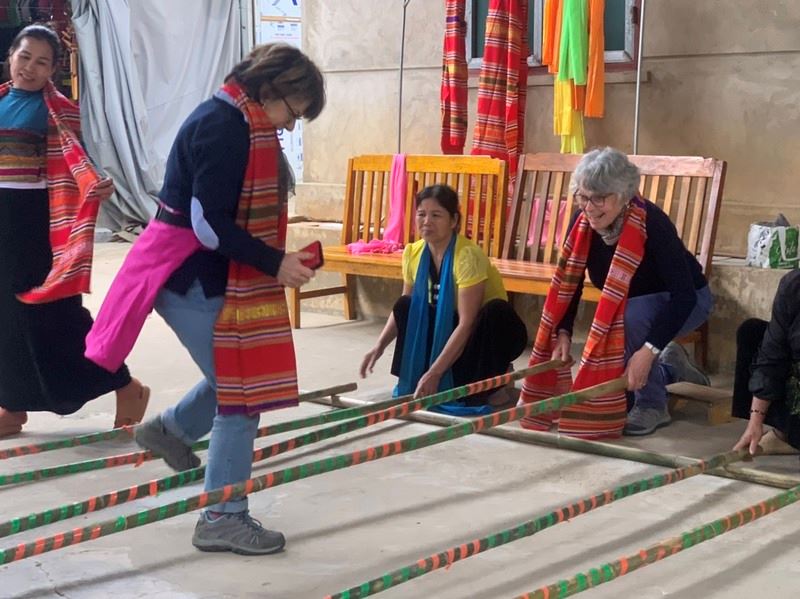 Our cherished visitors actively take part in authentic Vietnamese folk games